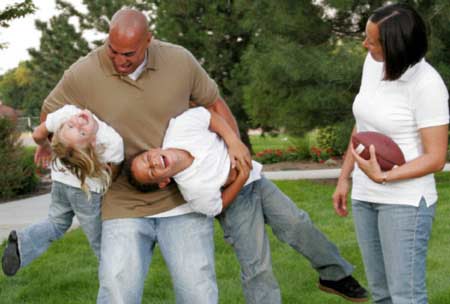 Active family in joyful play